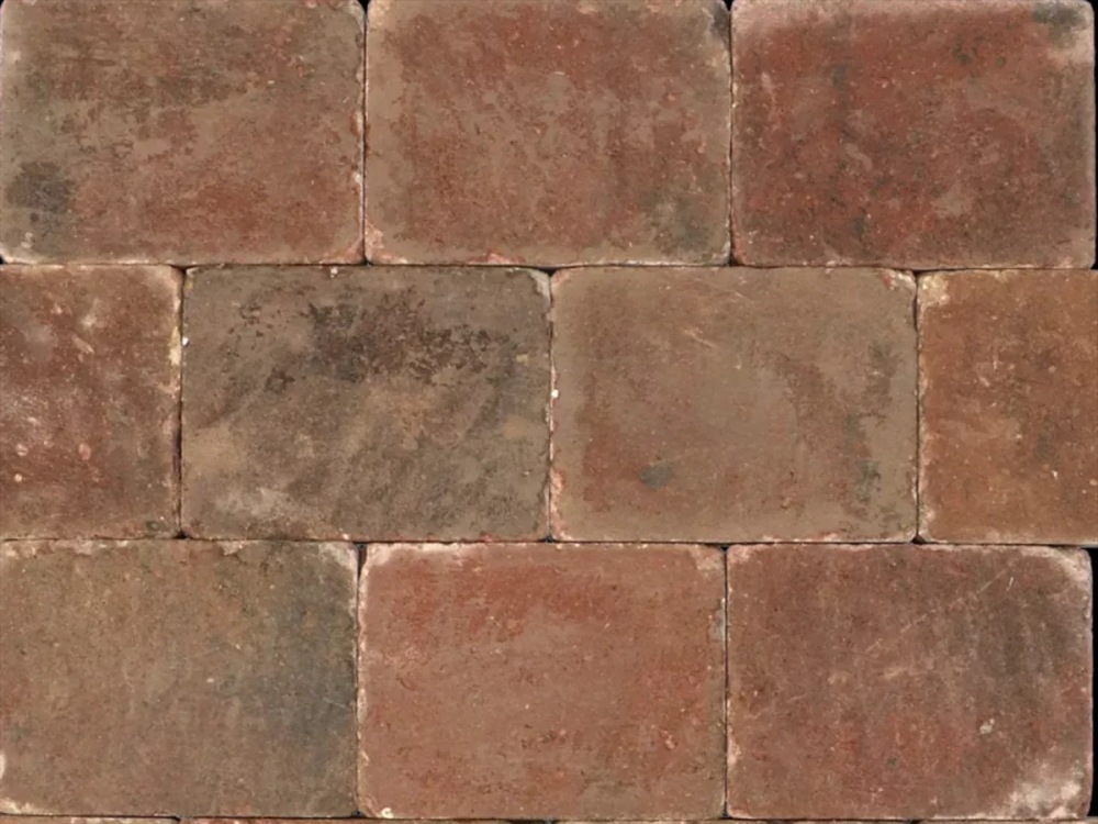 Trommelsteen 20x30x6 oudbont genu.
